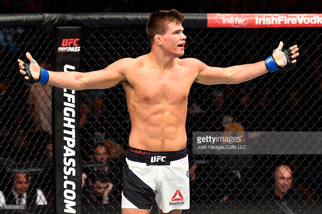 Arms out in the octagon